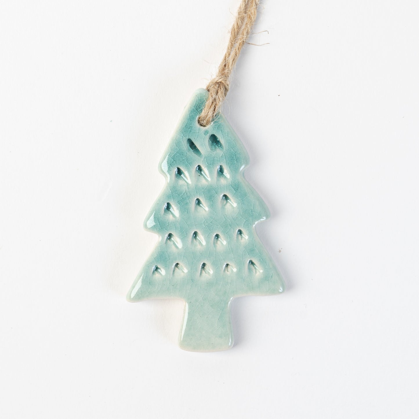 Arctic Blue textured Ceramic Christmas tree ornament on a white background handmade by the Wirksworth pottery company 