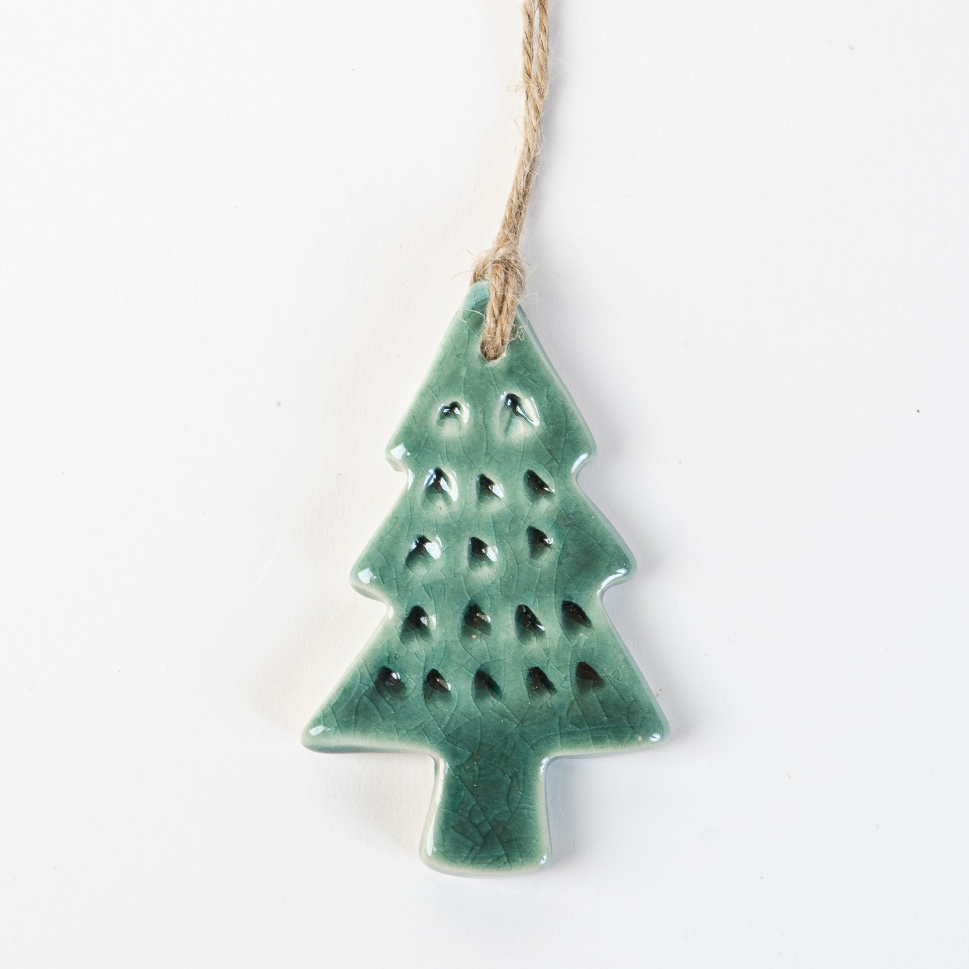Fir Green textured Ceramic Christmas tree ornament on a white background handmade by the Wirksworth pottery company 