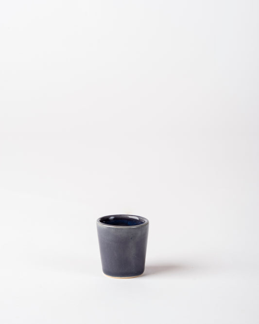 Handmade Navy Woad Blue Ceramic Shot 'Glass', perfect for spirits, gifting and interiors.