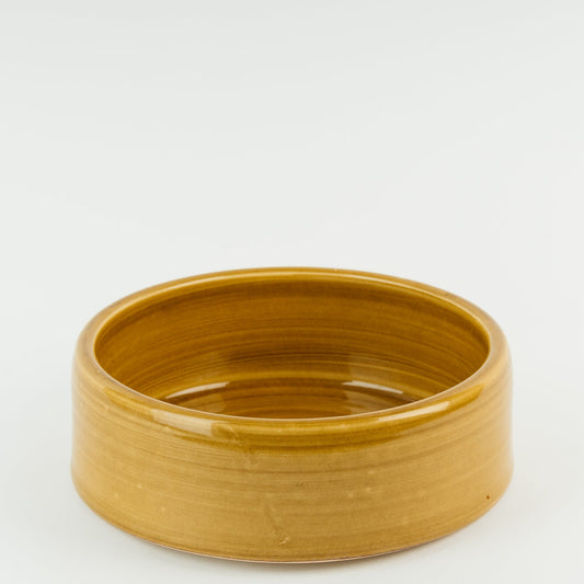 Yellow ceramic large dog bowl on a white background - the wirksworth pottery company