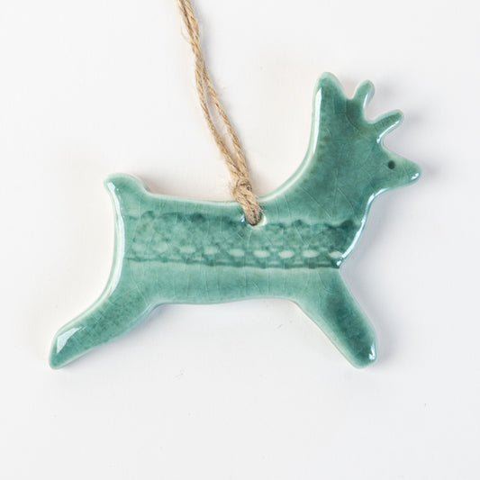 Fir green ceramic reindeer made by the wirksworth pottery company