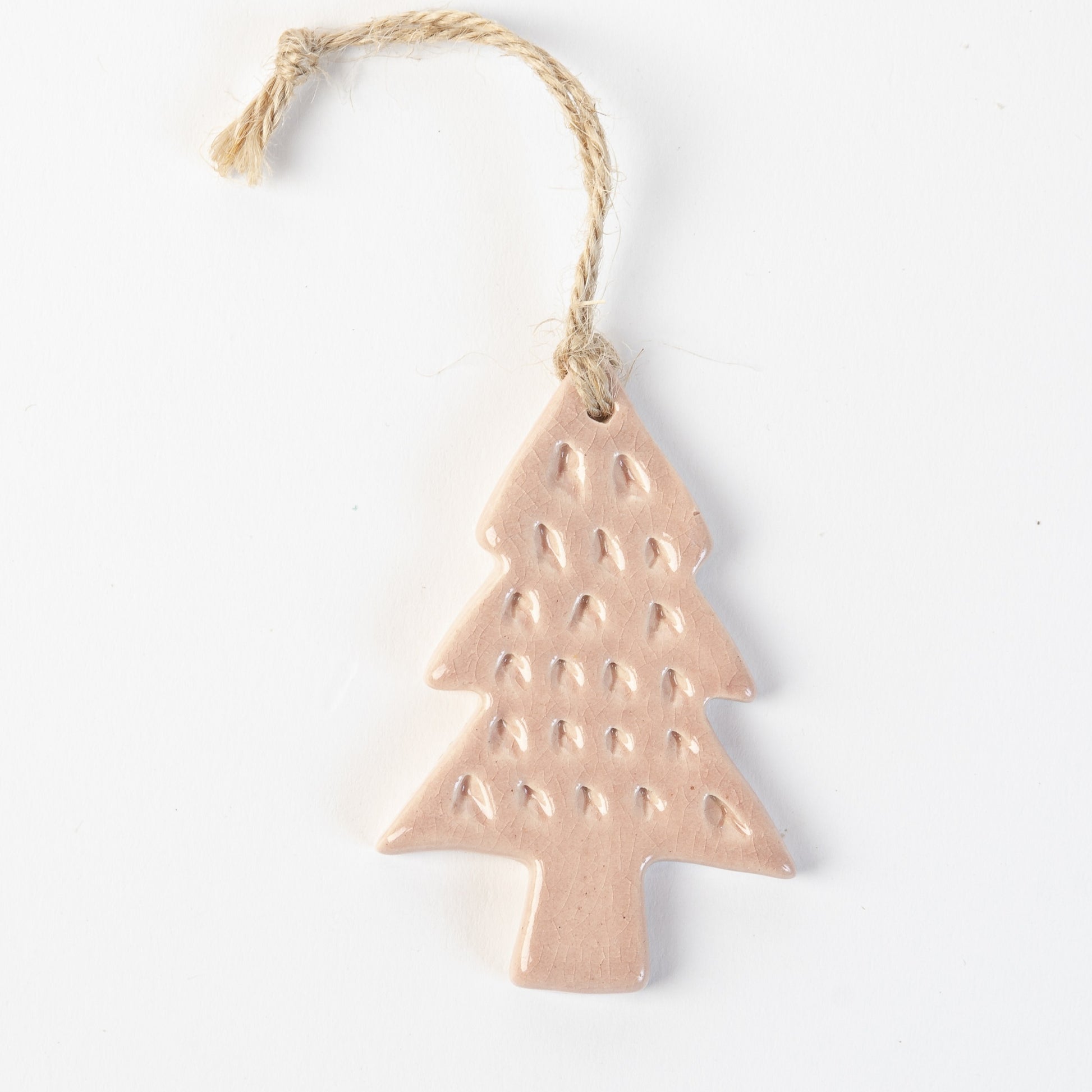 Winter rose textured Ceramic Christmas tree ornament on a white background handmade by the Wirksworth pottery company 
